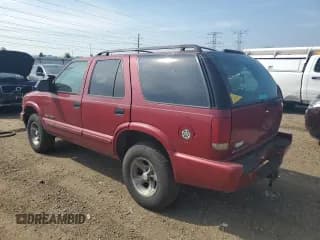 ✅ 2003 Chevrolet Blazer LS • VIN: 1GNCS13X33K110143 • Lot: 65122115. Wystawiony na Copart z przebiegiem 231 166 mil. Bezpłatny archiwum sprzedaży aukcyjnych z USA i szczegółowy raport historii pojazdu na DreamBid. Zdjęcie 2.