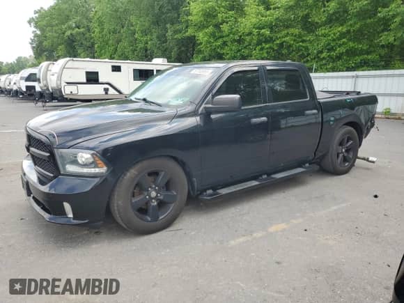 2014 Ram 1500 Tradesman with VIN 1C6RR7KT4ES267285, listed as a Copart auction lot 57248955 with 140,450 mi miles and Salvage title. Bid and sale history available at DreamBid. Image 1.