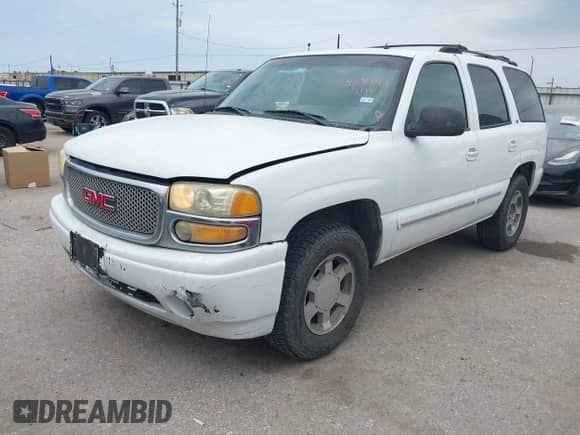 2002 Chevrolet Tahoe LS with VIN 1GNEC13Z22R147231, listed as a IAAI auction lot 42317819 with 227,904 mi miles and . Bid and sale history available at DreamBid. Image 2.