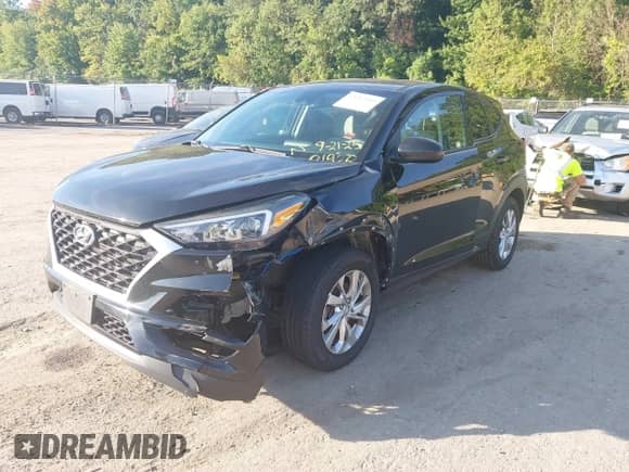 2019 Hyundai Tucson SE with VIN KM8J2CA40KU001142, listed as a IAAI auction lot 43362303 with 70,504 mi miles and . Bid and sale history available at DreamBid. Image 2.