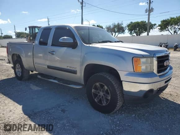 2010 GMC Sierra 1500 SLE with VIN 1GTSCVE08AZ116940, listed as a Copart auction lot 82693455 with 161,184 mi miles and Salvage title. Bid and sale history available at DreamBid. Image 4.
