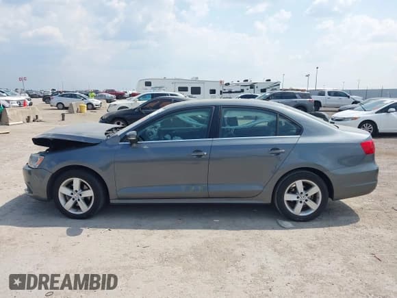 ✅ 2013 Volkswagen Jetta TDI w/Premium/Nav • VIN: 3VWLL7AJXDM291045 • Lot: 43227963. Listed on IAAI with 151,843 mi. Free auction sales archive from the USA and detailed vehicle history report at DreamBid. Image 14.
