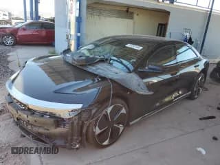 ✅ 2023 Lucid Air Touring • VIN: 50EA1TEA2PA003843 • Lot: 70153144. Wystawiony na Copart z przebiegiem 26 184 mil. Bezpłatny archiwum sprzedaży aukcyjnych z USA i szczegółowy raport historii pojazdu na DreamBid. Zdjęcie 1.