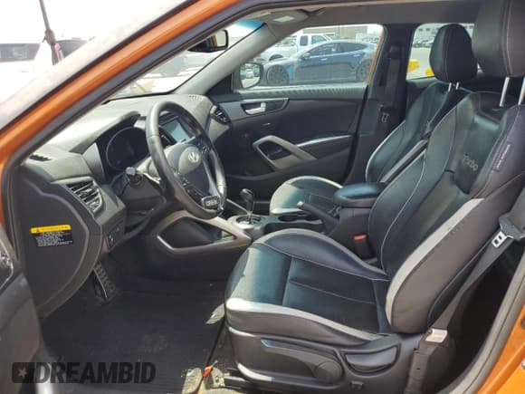 ✅ 2013 Hyundai Veloster Turbo • VIN: KMHTC6AE1DU167026 • Lot: 65680604. Wystawiony na Copart z przebiegiem 77 428 mil. Bezpłatny archiwum sprzedaży aukcyjnych z USA i szczegółowy raport historii pojazdu na DreamBid. Zdjęcie 7.