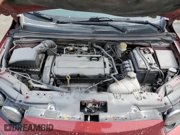 2014 Chevrolet Sonic LT z VIN 1G1JC5SH5E4188793, wystawiony jako Copart lot #71027934 z przebiegiem 140 677 mil mil oraz Szkoda całkowita • Salvage title. Historia ofert i sprzedaży dostępna na DreamBid. Obrazek 11.