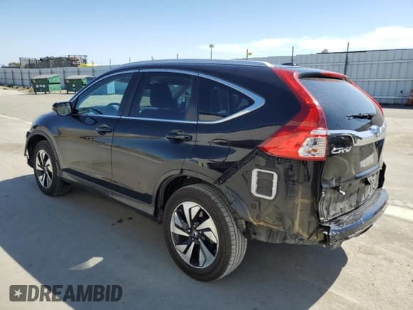 ✅ 2015 Honda CR-V Touring • VIN: 5J6RM3H95FL021816 • Лот: 81293285. Опубликован ранее на Copart с пробегом 137 194 миль. Бесплатный доступ к архиву аукционных продаж из США и подробный отчёт об истории автомобиля на DreamBid. Изображение 2.