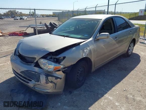 ✅ 2003 Toyota Camry LE • VIN: 4T1BE32K13U700872 • Lot: 43567879. Listed on IAAI with 202,805 mi. Free auction sales archive from the USA and detailed vehicle history report at DreamBid. Image 2.