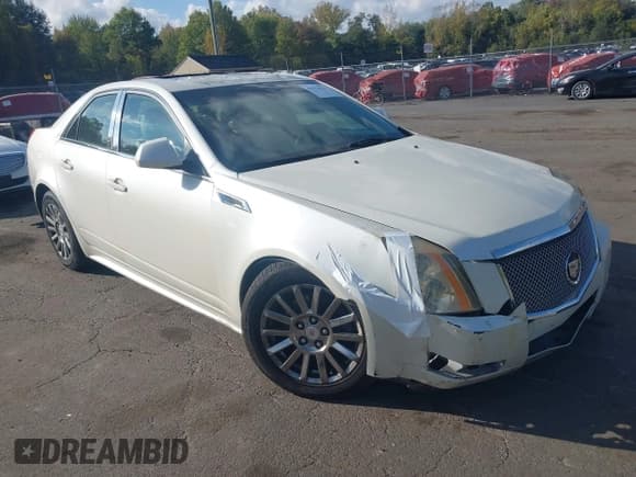 ✅ 2013 Cadillac CTS Luxury • VIN: 1G6DG5E57D0163994 • Lot: 43376631. Listed on IAAI with 132,088 mi. Free auction sales archive from the USA and detailed vehicle history report at DreamBid. Image 1.