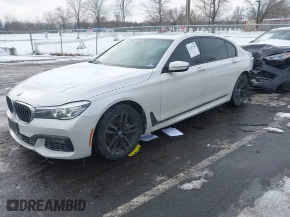 ✅ 2018 BMW 7 Series 740i xDrive • VIN: WBA7E4C59JGV23876 • Lot: 41381398. Listed on IAAI with 106,675 mi. Free auction sales archive from the USA and detailed vehicle history report at DreamBid. Image 2.