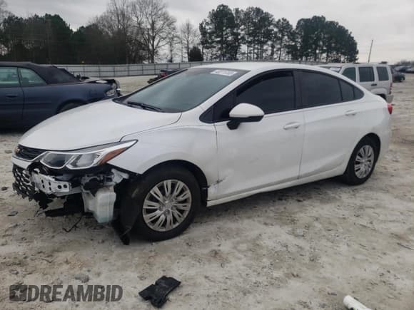 ✅ 2017 Chevrolet Cruze LS • VIN: 1G1BC5SM0H7174143 • Lot: 40271703. Listed on Copart with 59,329 mi. Free auction sales archive from the USA and detailed vehicle history report at DreamBid. Image 1.