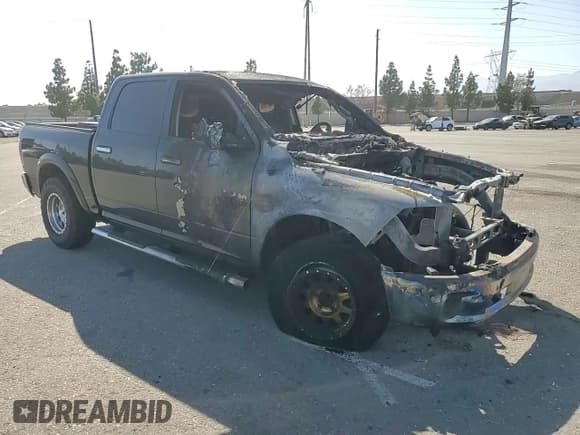 ✅ 2015 Ram 1500 Laramie • VIN: 1C6RR6NM9FS623410 • Lot: 61680915. Wystawiony na Copart z przebiegiem Nie podano. Bezpłatny archiwum sprzedaży aukcyjnych z USA i szczegółowy raport historii pojazdu na DreamBid. Zdjęcie 13.