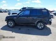 ✅ 2001 Suzuki Grand Vitara JLX • VIN: JS3TD62V414156342 • Lot: 41762508. Listed on IAAI with 214,235 mi. Free auction sales archive from the USA and detailed vehicle history report at DreamBid. Image 15.