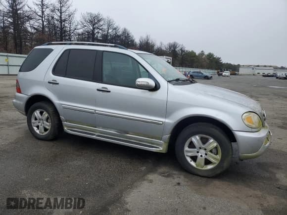 ✅ 2005 Mercedes-Benz M 500 • VIN: 4JGAB75E55A526309 • Lot: 51478095. Listed on Copart with 185,992 mi. Free auction sales archive from the USA and detailed vehicle history report at DreamBid. Image 4.