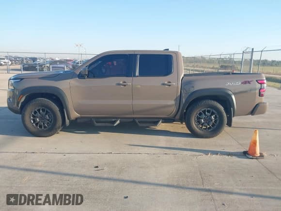 ✅ 2023 Nissan Frontier Pro-4X • VIN: 1N6ED1EK4PN674379 • Lot: 43437360. Listed on IAAI with 24,855 mi. Free auction sales archive from the USA and detailed vehicle history report at DreamBid. Image 14.