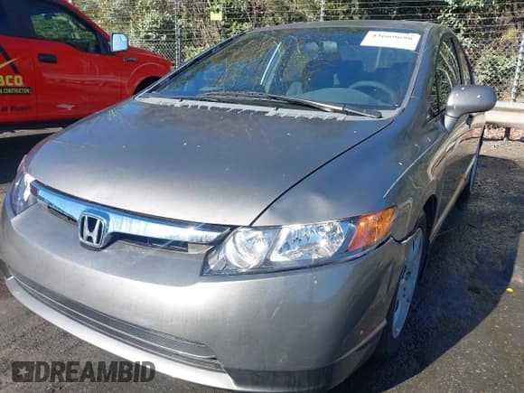 ✅ 2008 Honda Civic LX • VIN: 1HGFA15548L073496 • Lot: 43669698. Wystawiony na IAAI z przebiegiem 342 404 mil. Bezpłatny archiwum sprzedaży aukcyjnych z USA i szczegółowy raport historii pojazdu na DreamBid. Zdjęcie 6.