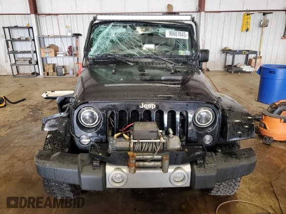 ✅ 2015 Jeep Wrangler Unlimited Sahara • VIN: 1C4BJWEG2FL552394 • Lot: 90607845. Listed on Copart with 161,896 mi. Free auction sales archive from the USA and detailed vehicle history report at DreamBid. Image 5.
