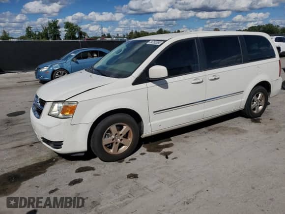 2008 Dodge Grand Caravan SXT с VIN 2D8HN54P48R716105, выставлен на аукционе Copart как лот 84782085 с пробегом 233 016 миль миль и Списание • Salvage title. История ставок и продаж доступна на DreamBid. Изображение 1.