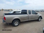 ✅ 2001 Ford F-150 XL • VIN: 1FTRX17W21NB19028 • Lot: 42354428. Listed on IAAI with 189,824 mi. Free auction sales archive from the USA and detailed vehicle history report at DreamBid. Image 14.