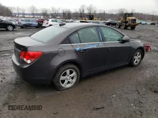 ✅ 2015 Chevrolet Cruze LT • VIN: 1G1PC5SBXF7112797 • Lot: 42101493. Listed on Copart with 141,471 mi. Free auction sales archive from the USA and detailed vehicle history report at DreamBid. Image 3.