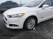 ✅ 2014 Ford Fusion Titanium • VIN: 3FA6P0SU6ER397622 • Lot: 43816342. Listed on IAAI with 121,145 mi. Free auction sales archive from the USA and detailed vehicle history report at DreamBid. Image 12.