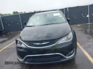 ✅ 2018 Chrysler Pacifica Hybrid Touring L • VIN: 2C4RC1L74JR183472 • Lot: 42414724. Listed on IAAI with 115,256 mi. Free auction sales archive from the USA and detailed vehicle history report at DreamBid. Image 12.