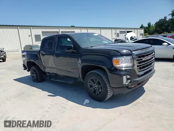 ✅ 2022 GMC Canyon 4WD AT4 • VIN: 1GTG6FEN2N1215238 • Лот: 70363545. Опубликован ранее на Copart с пробегом 63 938 миль. Бесплатный доступ к архиву аукционных продаж из США и подробный отчёт об истории автомобиля на DreamBid. Изображение 13.