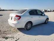 ✅ 2012 Suzuki SX4 LE • VIN: JS2YC5A37C6303297 • Lot: 91703025. Wystawiony na Copart z przebiegiem 113 870 mil. Bezpłatny archiwum sprzedaży aukcyjnych z USA i szczegółowy raport historii pojazdu na DreamBid. Zdjęcie 3.