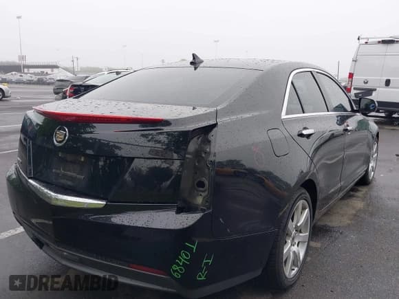 ✅ 2014 Cadillac ATS Standard RWD • VIN: 1G6AA5RA0E0106484 • Lot: 42496217. Listed on IAAI with 124,543 mi. Free auction sales archive from the USA and detailed vehicle history report at DreamBid. Image 4.