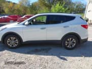 ✅ 2014 Hyundai Santa Fe • VIN: 5XYZUDLB4EG175627 • Lot: 43428688. Listed on IAAI with 150,000 mi. Free auction sales archive from the USA and detailed vehicle history report at DreamBid. Image 14.