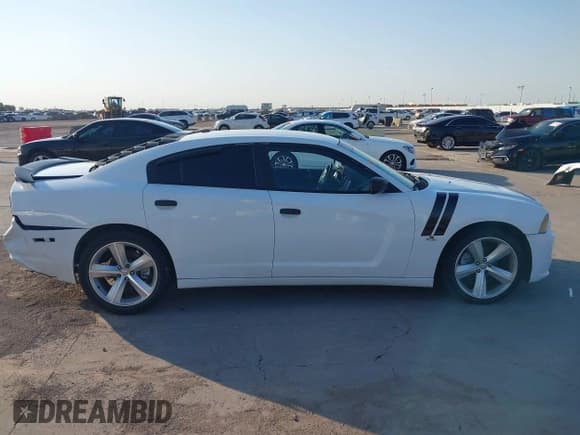 ✅ 2014 Dodge Charger SXT Plus • VIN: 2C3CDXHG8EH287560 • Lot: 43116564. Listed on IAAI with 194,629 mi. Free auction sales archive from the USA and detailed vehicle history report at DreamBid. Image 13.