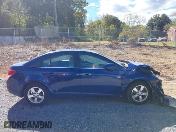 2012 Chevrolet Cruze 1LT z VIN 1G1PF5SC6C7111738, wystawiony jako IAAI lot #43431115 z przebiegiem 203 531 mil mil oraz . Historia ofert i sprzedaży dostępna na DreamBid. Obrazek 14.