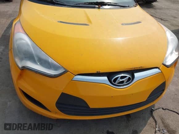 2012 Hyundai Veloster w/Gray Int z VIN KMHTC6AD5CU039913, wystawiony jako IAAI lot #42409269 z przebiegiem 177 079 mil mil oraz . Historia ofert i sprzedaży dostępna na DreamBid. Obrazek 6.