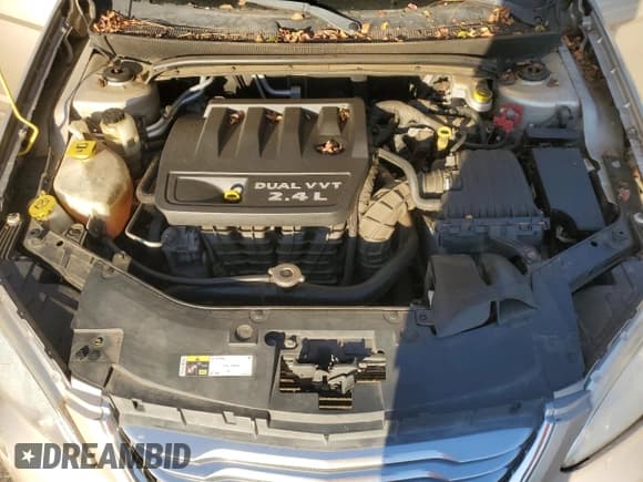 ✅ 2014 Chrysler 200 LX • VIN: 1C3CCBAB7EN206477 • Лот: 82534185. Опубликован ранее на Copart с пробегом 177 601 миль. Бесплатный доступ к архиву аукционных продаж из США и подробный отчёт об истории автомобиля на DreamBid. Изображение 11.