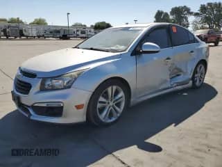 2015 Chevrolet Cruze LTZ z VIN 1G1PG5SB1F7122056, wystawiony jako Copart lot #80411755 z przebiegiem 173 167 mil mil oraz Szkoda całkowita • Salvage title. Historia ofert i sprzedaży dostępna na DreamBid. Obrazek 1.