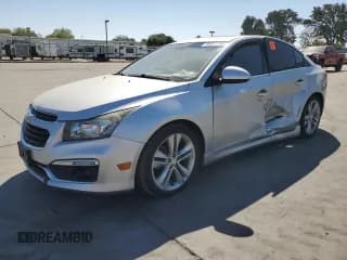 ✅ 2015 Chevrolet Cruze LTZ • VIN: 1G1PG5SB1F7122056 • Lot: 80411755. Listed on Copart with 173,167 mi. Free auction sales archive from the USA and detailed vehicle history report at DreamBid. Image 1.