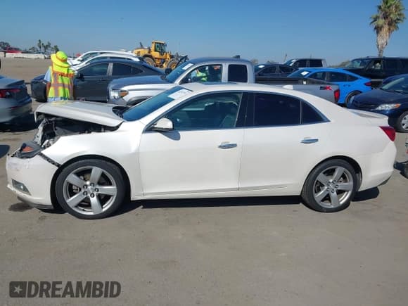 ✅ 2013 Chevrolet Malibu LTZ • VIN: 1G11J5SX5DF183934 • Lot: 43282719. Listed on IAAI with 92,538 mi. Free auction sales archive from the USA and detailed vehicle history report at DreamBid. Image 14.