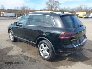✅ 2011 Volkswagen Touareg Sport • VIN: WVGFF9BP5BD000803 • Лот: 43596680. Опубликован ранее на IAAI с пробегом 107 740 миль. Бесплатный доступ к архиву аукционных продаж из США и подробный отчёт об истории автомобиля на DreamBid. Изображение 3.