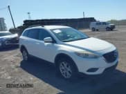 ✅ 2015 Mazda CX-9 Touring • VIN: JM3TB3CV1F0461403 • Lot: 42148325. Listed on IAAI with 143,452 mi. Free auction sales archive from the USA and detailed vehicle history report at DreamBid. Image 1.