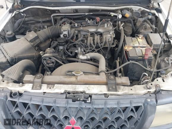 ✅ 2000 Mitsubishi Montero Sport LS • VIN: JA4LS31H0YP021389 • Lot: 41443537. Wystawiony na IAAI z przebiegiem 253 565 mil. Bezpłatny archiwum sprzedaży aukcyjnych z USA i szczegółowy raport historii pojazdu na DreamBid. Zdjęcie 10.