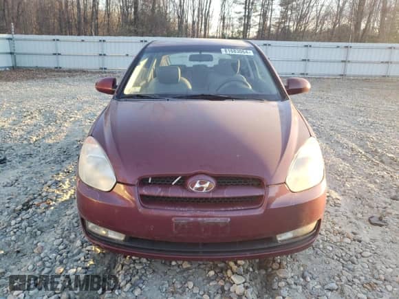 2007 Hyundai Accent SE z VIN KMHCN36CX7U041087, wystawiony jako Copart lot #81683064 z przebiegiem 137 429 mil mil oraz Czysty tytuł • Clean title. Historia ofert i sprzedaży dostępna na DreamBid. Obrazek 5.