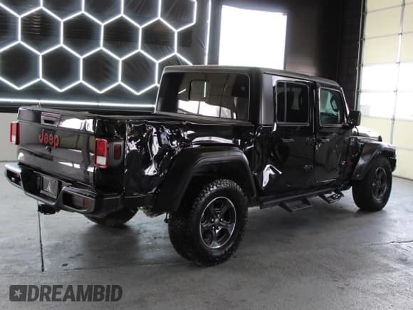 ✅ 2020 Jeep Gladiator Sport S • VIN: 1C6HJTAG1LL158662 • Лот: 86172925. Опубликован ранее на Copart с пробегом 46 837 миль. Бесплатный доступ к архиву аукционных продаж из США и подробный отчёт об истории автомобиля на DreamBid. Изображение 3.