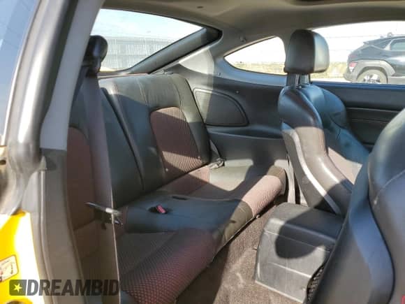 2006 Hyundai Tiburon GT с VIN KMHHN65F86U196206, выставлен на аукционе Copart как лот 83924625 с пробегом 137 605 миль миль и Списание • Salvage title. История ставок и продаж доступна на DreamBid. Изображение 10.