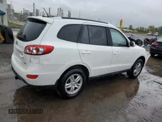 2012 Hyundai Santa Fe GLS с VIN 5XYZGDAG3CG166338, выставлен на аукционе Copart как лот 73139004 с пробегом 124 377 миль миль и Чистый • Clean title. История ставок и продаж доступна на DreamBid. Изображение 3.