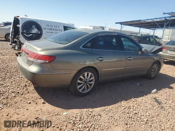 2006 Hyundai Azera SE с VIN KMHFC46F06A122652, выставлен на аукционе Copart как лот 50221265 с пробегом 198 552 миль миль и Списание • Salvage title. История ставок и продаж доступна на DreamBid. Изображение 3.