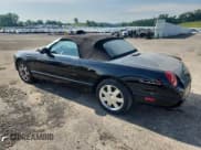 ✅ 2003 Ford Thunderbird Deluxe • VIN: 1FAHP60A03Y104817 • Lot: 63783485. Wystawiony na Copart z przebiegiem 106 673 mil. Bezpłatny archiwum sprzedaży aukcyjnych z USA i szczegółowy raport historii pojazdu na DreamBid. Zdjęcie 2.