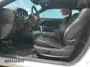 2010 Dodge Challenger SE z VIN 2B3CJ4DV1AH321342, wystawiony jako Copart lot #67499744 z przebiegiem 129 834 mil mil oraz Szkoda całkowita • Salvage title. Historia ofert i sprzedaży dostępna na DreamBid. Obrazek 7.