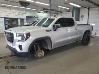 ✅ 2021 GMC Sierra 1500 SLE • VIN: 1GTR9BED8MZ236210 • Лот: 56898185. Опубликован ранее на Copart с пробегом 128 697 миль. Бесплатный доступ к архиву аукционных продаж из США и подробный отчёт об истории автомобиля на DreamBid. Изображение 1.