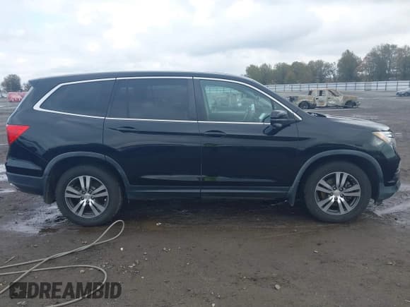 ✅ 2017 Honda Pilot EX-L • VIN: 5FNYF5H58HB000744 • Lot: 43743519. Listed on IAAI with 215,380 mi. Free auction sales archive from the USA and detailed vehicle history report at DreamBid. Image 13.