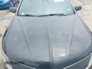 ✅ 2014 Lincoln MKS • VIN: 1LNHL9DK9EG602092 • Lot: 43049470. Wystawiony na IAAI z przebiegiem 302 939 mil. Bezpłatny archiwum sprzedaży aukcyjnych z USA i szczegółowy raport historii pojazdu na DreamBid. Zdjęcie 6.