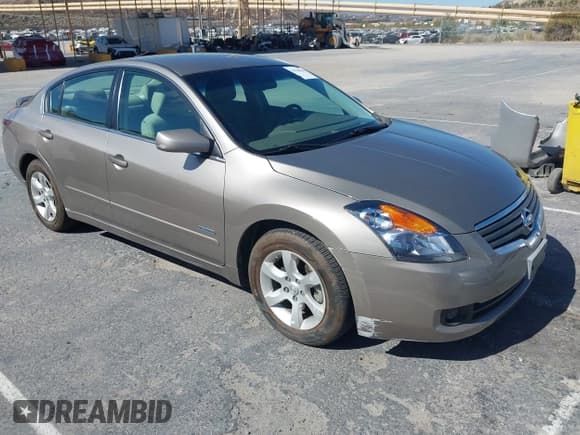 ✅ 2007 Nissan Altima Hybrid • VIN: 1N4CL21E57C154678 • Lot: 43044959. Wystawiony na IAAI z przebiegiem 59 273 mil. Bezpłatny archiwum sprzedaży aukcyjnych z USA i szczegółowy raport historii pojazdu na DreamBid. Zdjęcie 1.